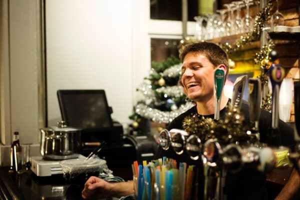 Aaron behind the bar